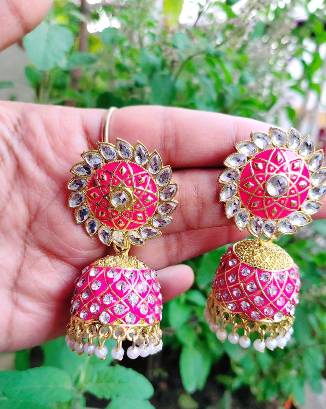Fashionable kundan and pearl embedded jhumka